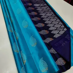 Adorning Firozi Soft Silk Saree With Magnificat Blouse Piece